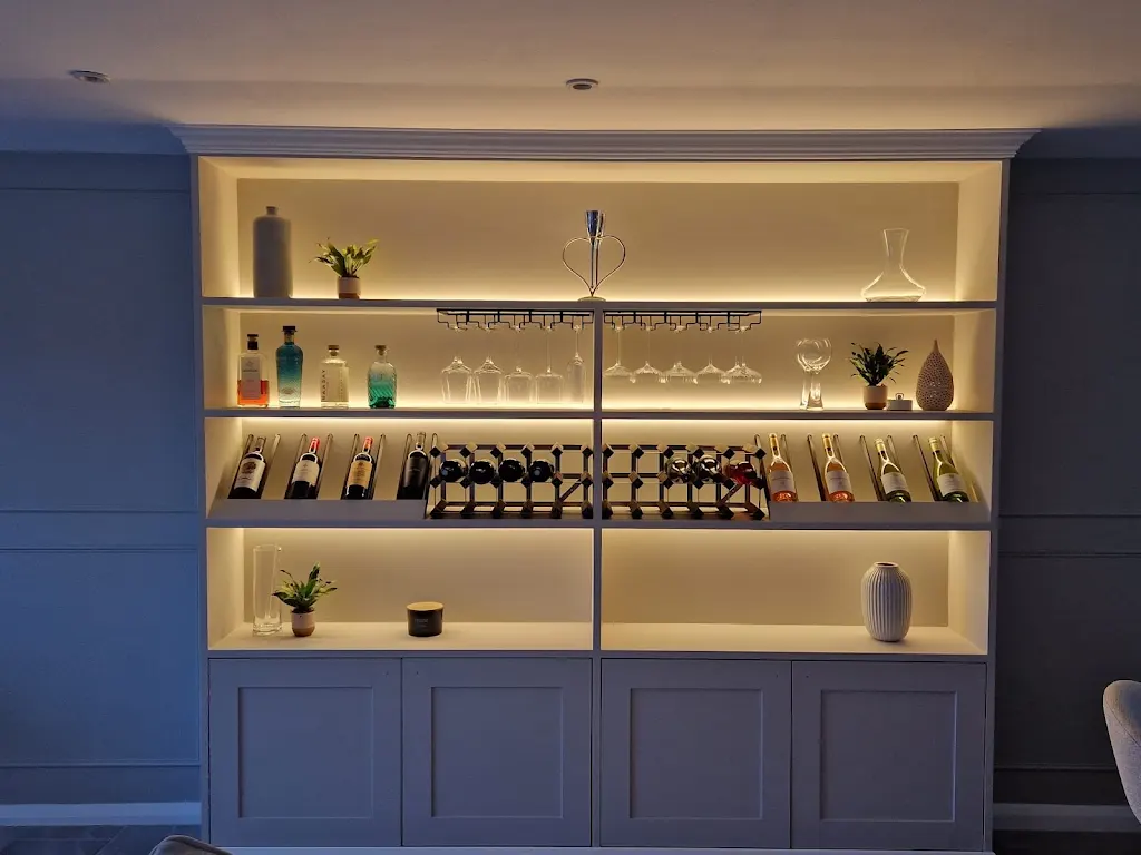 Bespoke backlit wine and drinks shelving by Putnam & Sons