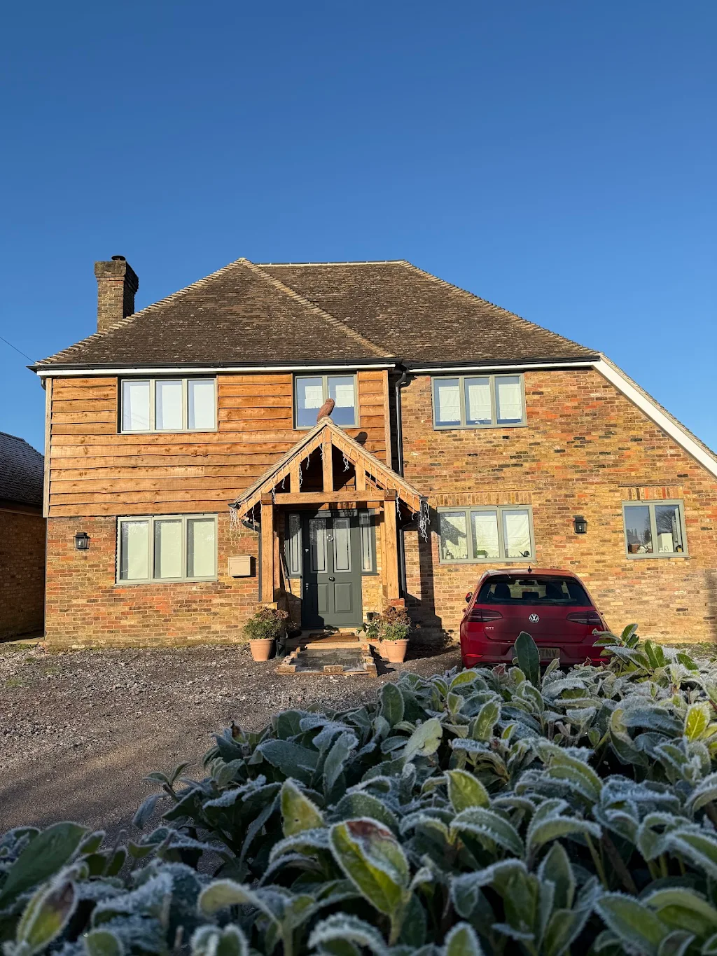 Oak porch and cladding on residential property