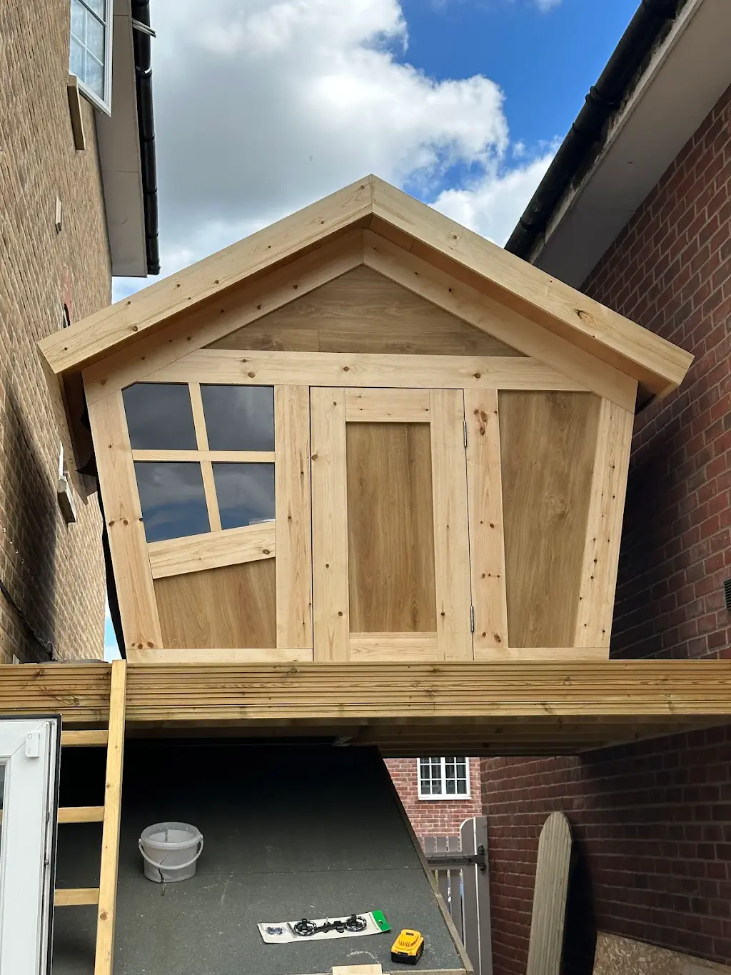 Bespoke kids playhouse with balcony